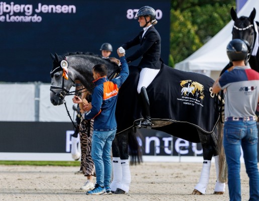 Proud James and Mette Sejbjerg Jensen. Photo: Sportfoto Lafrentz